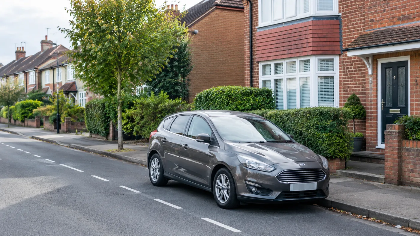 Car parked on a quiet British residential street